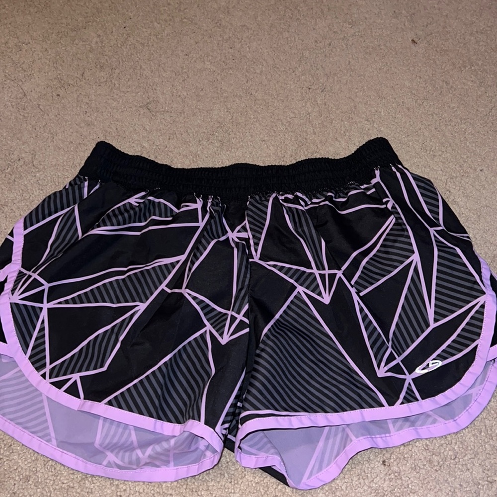 Black and purple champion shorts.